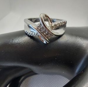 SUN 925 sterling and CZ diamond ring. Sz7